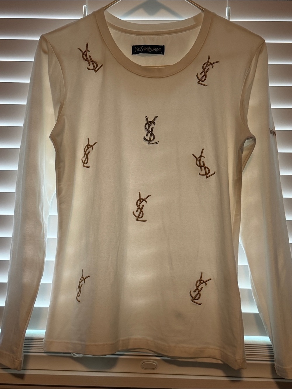 NWOT. Yves Saint Laurent Cream Long Sleeve Tee with gold YSL Embroidery
